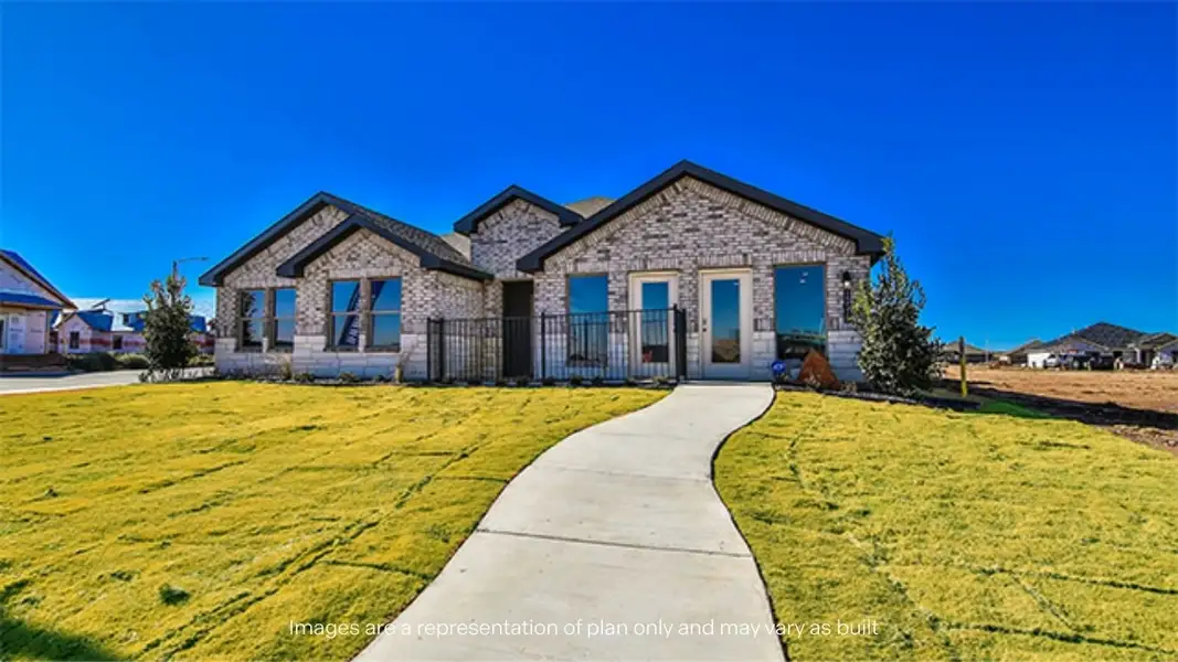 Front exterior of a new home in Viridian, Lubbock, TX, highlighting curb appeal (Image 1). Front exterior of a new home in Viridian, Lubbock, TX, highlighting curb appeal (Image 1).