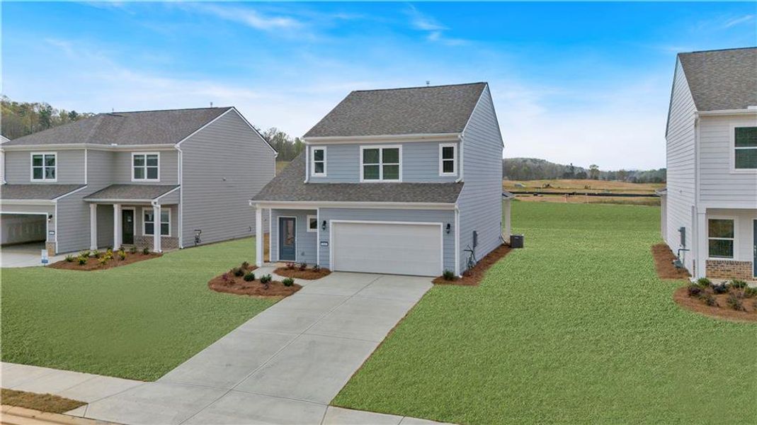 Front exterior of a new home in Salacoa, Calhoun, GA, highlighting curb appeal (Image 2). Front exterior of a new home in Salacoa, Calhoun, GA, highlighting curb appeal (Image 2).