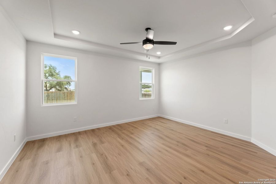 Spacious, unfurnished interior of a new home in Hunter's Ranch, San Antonio (Image 11).