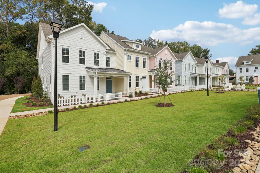 Exterior details and patio area of a home in Walk23, Huntersville (Image 20).