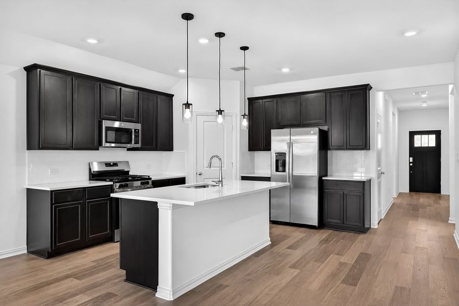 Furnished interior view inside a new home in Parks at Foster Crossing, Anna (Image 11).