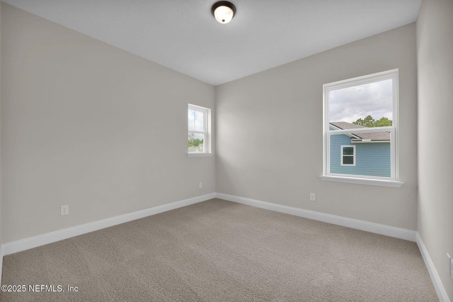 Spacious, unfurnished interior of a new home in Courtney Oaks at SilverLeaf, St. Augustine (Image 22).