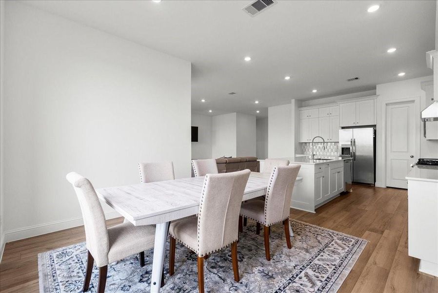 The primary suite is tucked away in the back corner of the home and includes a spa-like en-suite bath with an oversized walk-in shower, double sinks, and a generous walk-in closet. The primary suite is tucked away in the back corner of the home and includes a spa-like en-suite bath with an oversized walk-in shower, double sinks, and a generous walk-in closet.