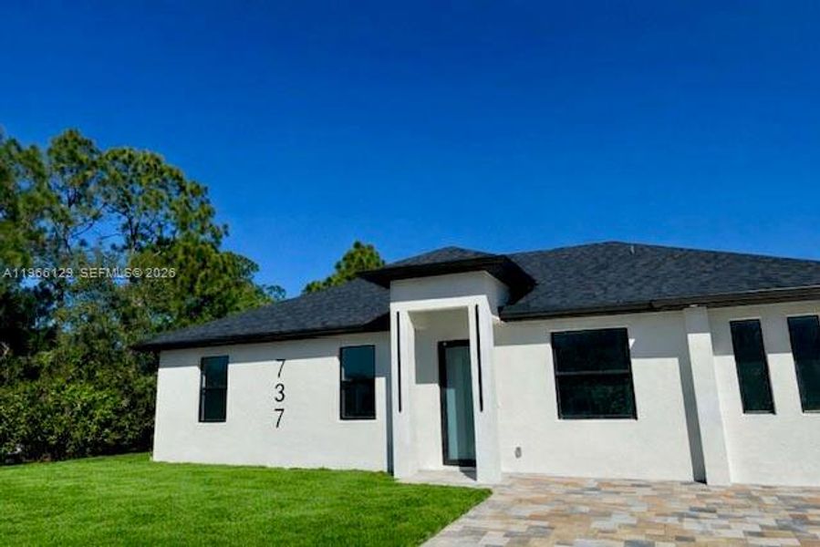 Exterior details and patio area of a home in , Lehigh Acres (Image 16). Exterior details and patio area of a home in , Lehigh Acres (Image 16).