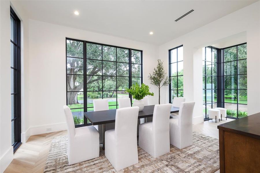 Dining room with recessed lighting and baseboards Dining room with recessed lighting and baseboards