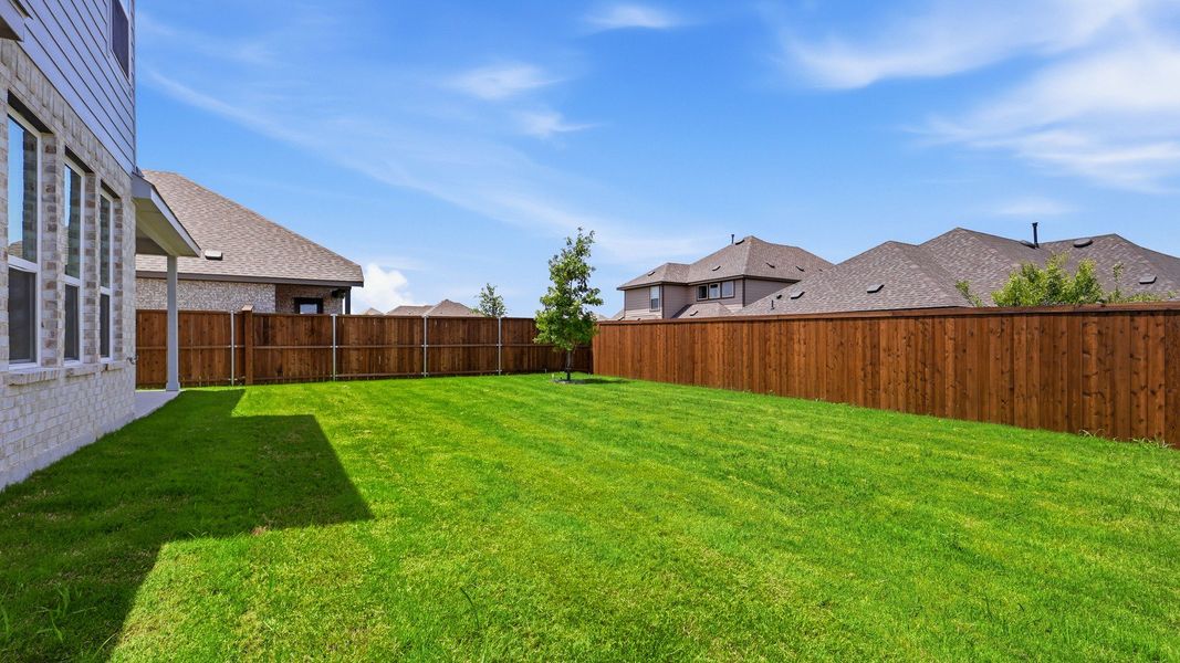 Exterior details and patio area of a home in Anna Ranch, Anna (Image 26).