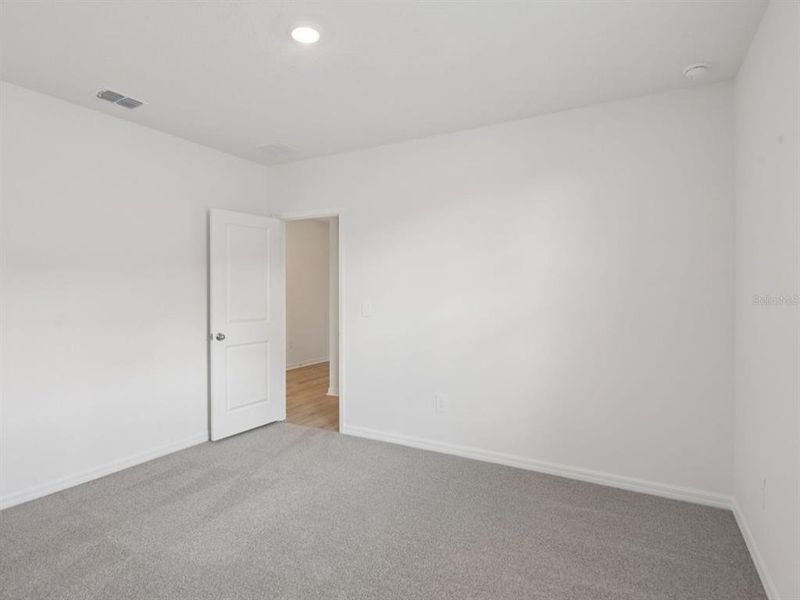 Spacious, unfurnished interior of a new home in Salt Meadows - Classic Series, Parrish (Image 20).