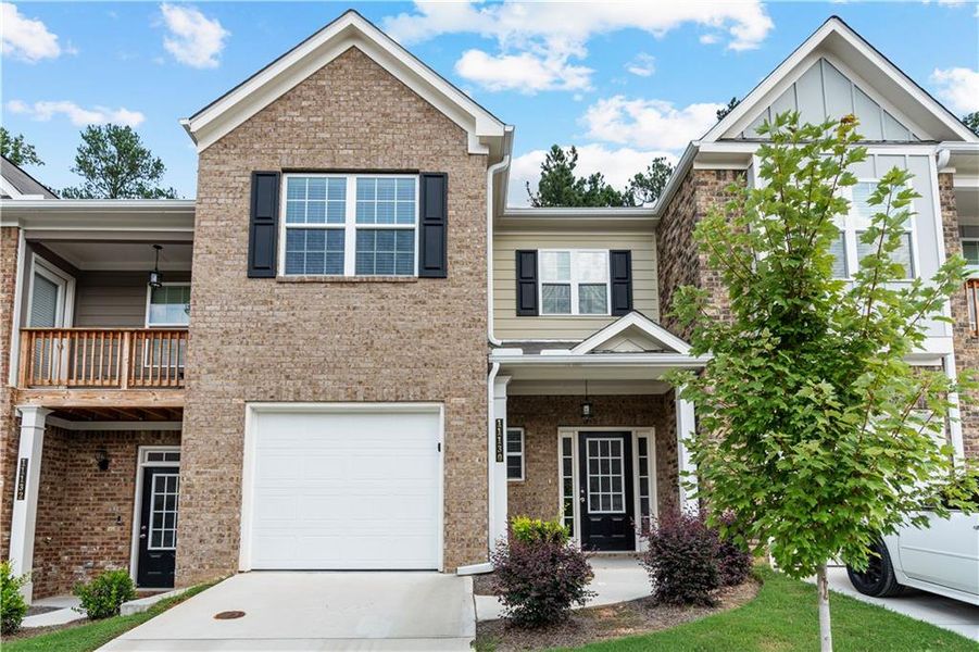 Front exterior of a new home in , Covington, GA, highlighting curb appeal (Image 25).