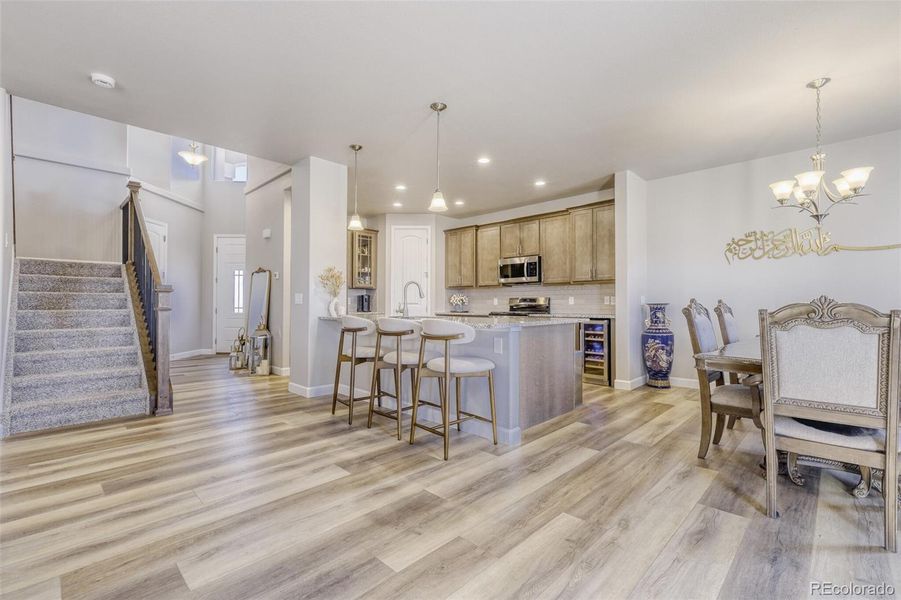 Front foyer into kitchen and open concept living area