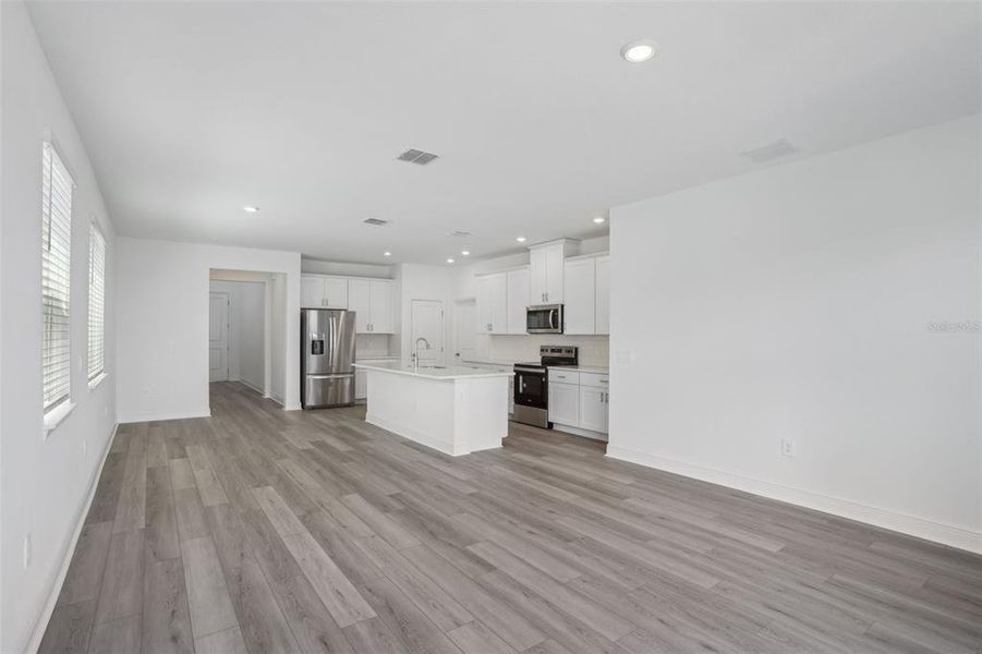 Spacious, unfurnished interior of a new home in Cyrene at Minneola - Villas, Montverde (Image 16). Spacious, unfurnished interior of a new home in Cyrene at Minneola - Villas, Montverde (Image 16).
