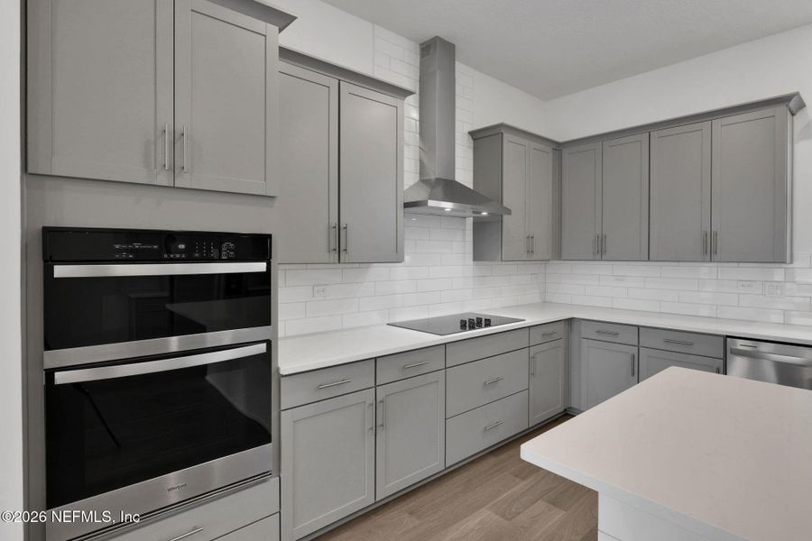 Furnished interior view inside a new home in North Beach Townhomes, Jacksonville Beach (Image 9).