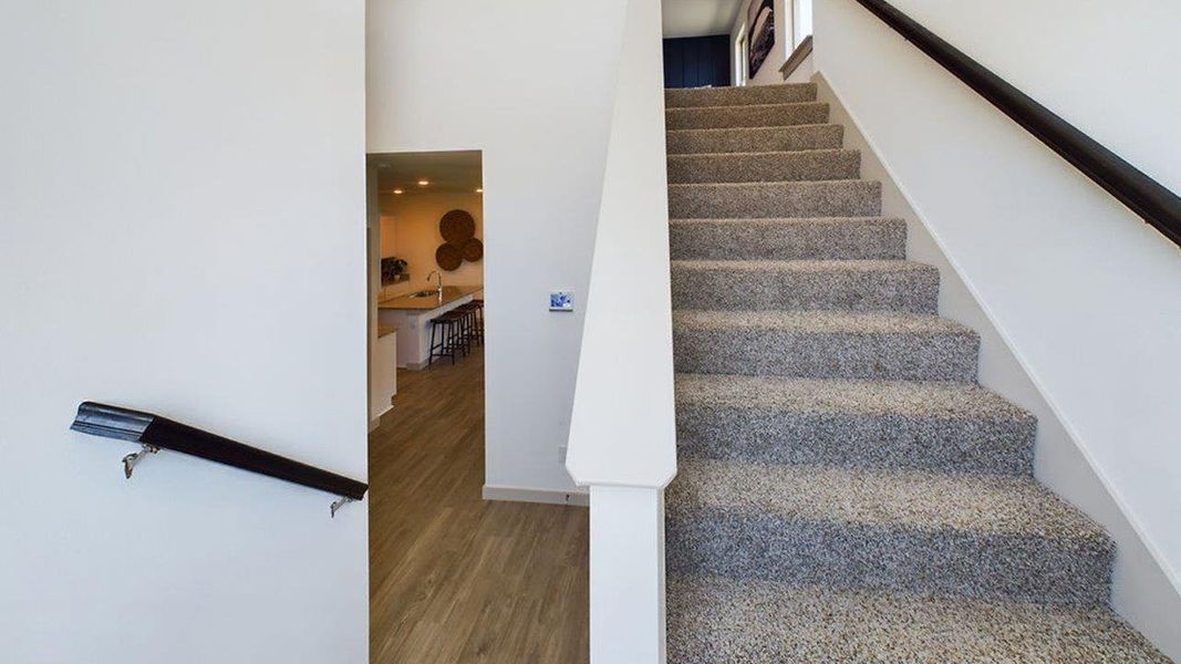Representative furnished interior of a home built from the The Pierce by D.R. Horton in Overlook West, Wolfforth (Image 16).