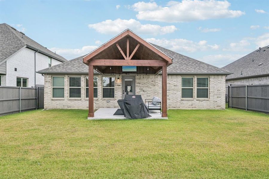 Front exterior of a new home in , Venus, TX, highlighting curb appeal (Image 21).