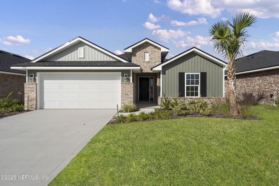 Front exterior of a new home in , Green Cove Springs, FL, highlighting curb appeal (Image 1).