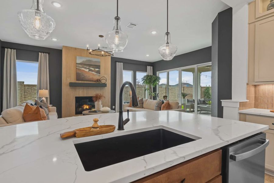 Representative furnished interior of a home built from the Acadia by Chesmar Homes in Beacon Point, Texas City (Image 19).