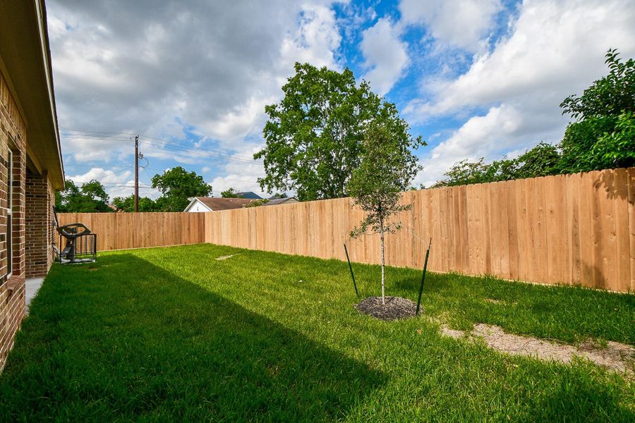 Exterior details and patio area of a home in , Houston (Image 3). Exterior details and patio area of a home in , Houston (Image 3).