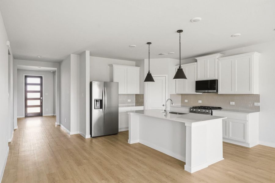 Furnished interior view inside a new home in Sanford Farms, Waller (Image 8).