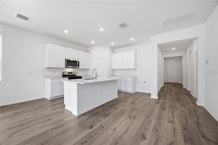 Furnished interior view inside a new home in , Okahumpka (Image 12).
