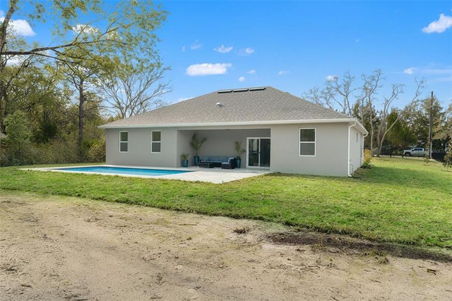 Exterior details and patio area of a home in , Spring Hill (Image 26).