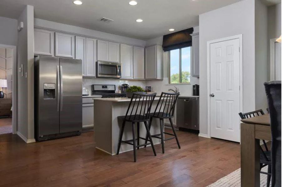 Photo of Pulte model home with same floor plan, not of actual home listed.