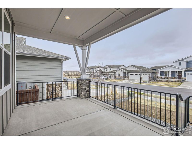 Exterior details and patio area of a home in RainDance, Windsor (Image 4).