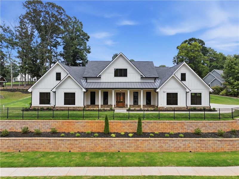 Front exterior of a new home in , Commerce, GA, highlighting curb appeal (Image 1). Front exterior of a new home in , Commerce, GA, highlighting curb appeal (Image 1).
