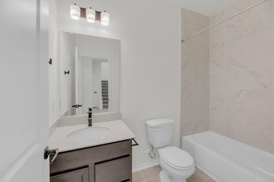 Furnished interior view inside a new home in Salerno - Classic Collection, Round Rock (Image 14). Furnished interior view inside a new home in Salerno - Classic Collection, Round Rock (Image 14).