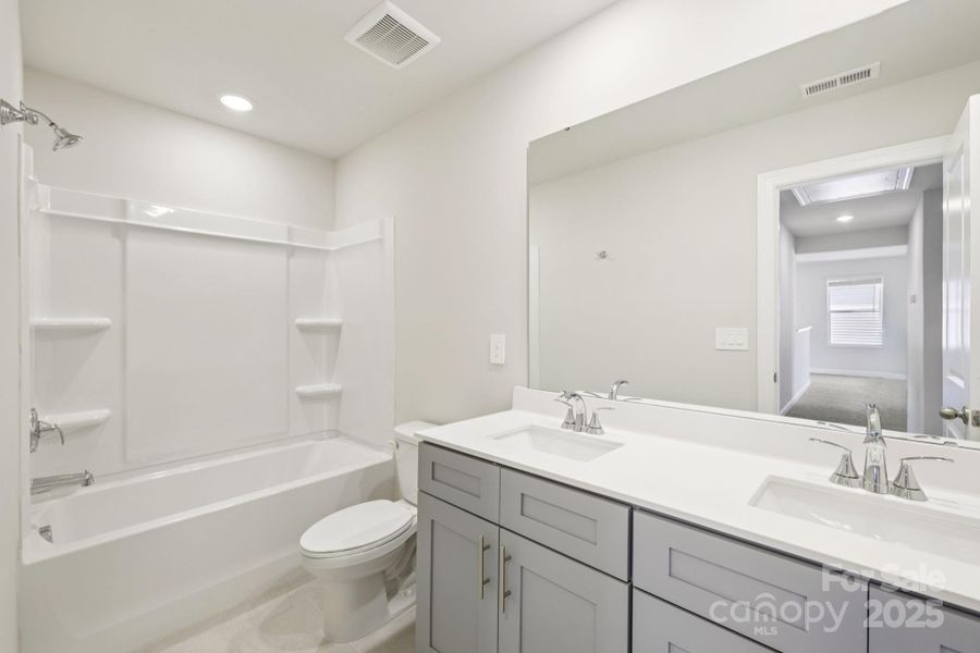 Photo is not of the actual home, but is an inspirational photo of builder’s model home and may depict options, furnishings, and/or decorator features that are not included