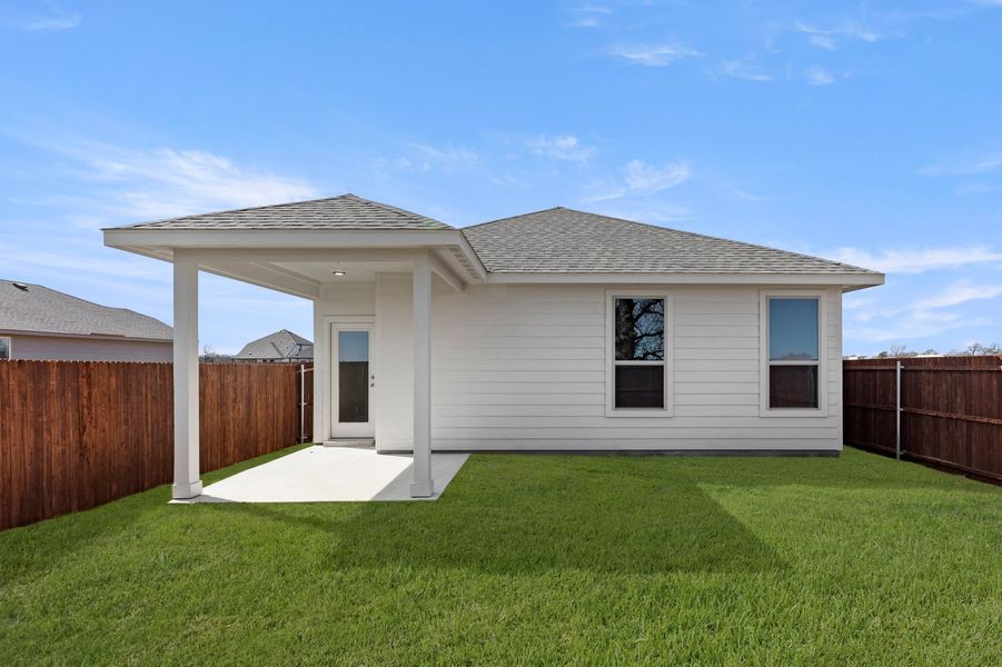 Front exterior of a new home in Belmont, Aubrey, TX, highlighting curb appeal (Image 26). Front exterior of a new home in Belmont, Aubrey, TX, highlighting curb appeal (Image 26).