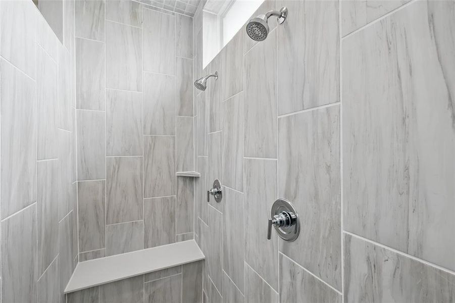 Bathroom view of a tile shower Bathroom view of a tile shower