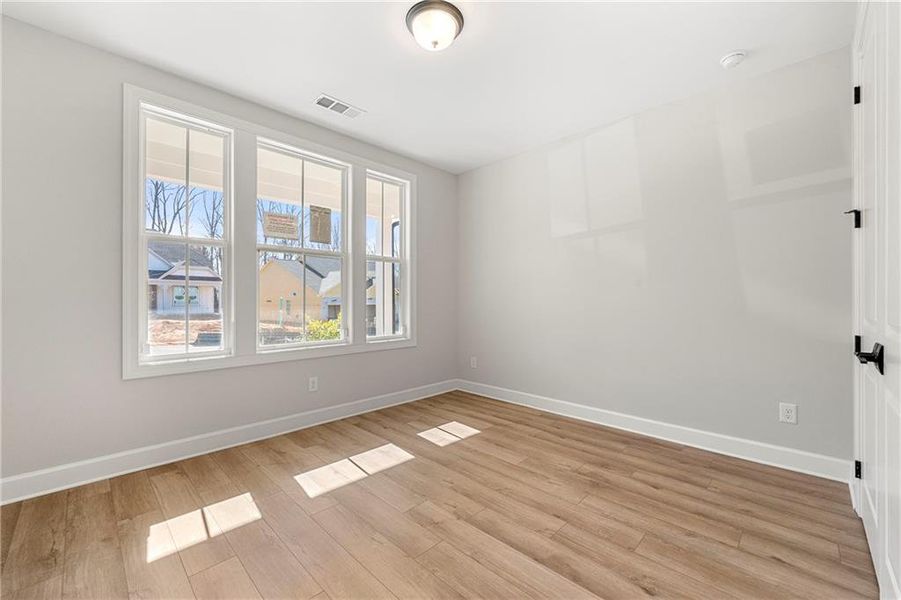 Spacious, unfurnished interior of a new home in Cresswind Georgia at Twin Lakes, Hoschton (Image 18).