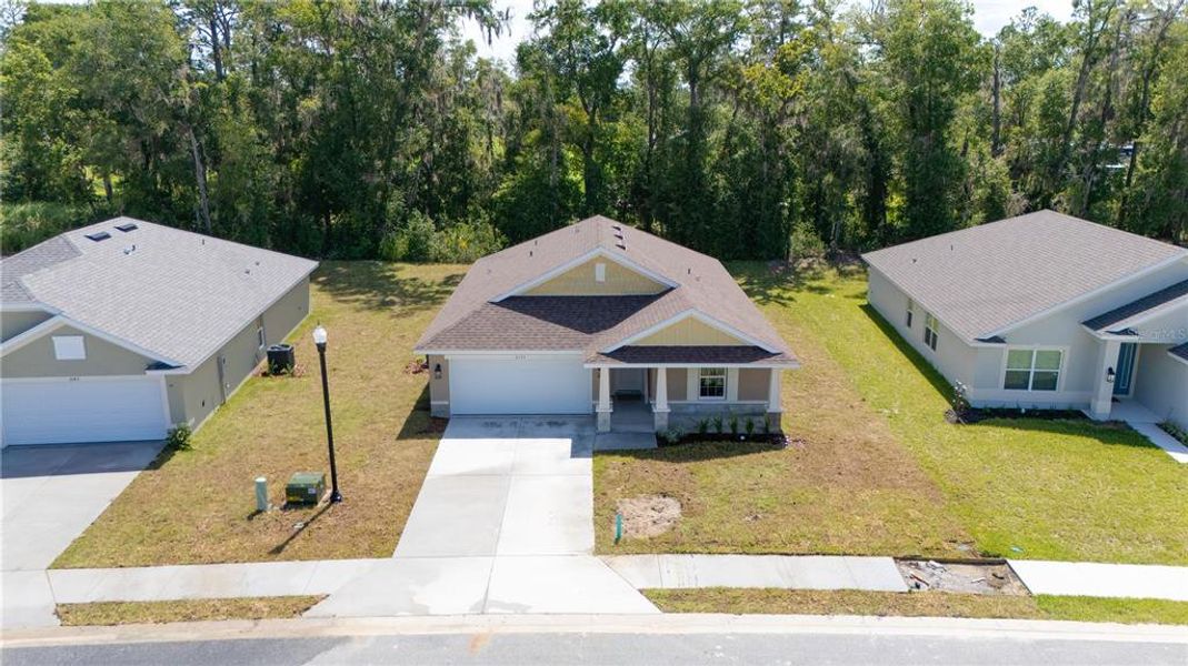 Front exterior of a new home in Oak Hill Plantation, Ocala, FL, highlighting curb appeal (Image 2).