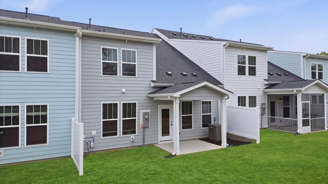 Exterior details and patio area of a home in Village at Midway, Anderson (Image 21).