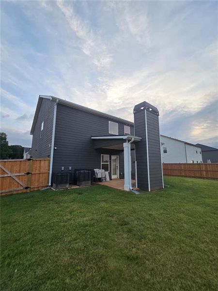 Exterior details and patio area of a home in Fern Dale, Fairburn (Image 3).