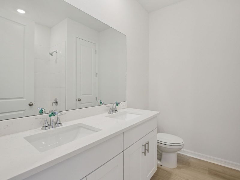 Furnished interior view inside a new home in Coasterra - Reserve Series, Palmetto (Image 9). Furnished interior view inside a new home in Coasterra - Reserve Series, Palmetto (Image 9).