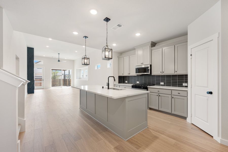 Furnished interior view inside a new home in Willow Grove Single-Family Homes, Melissa (Image 9).