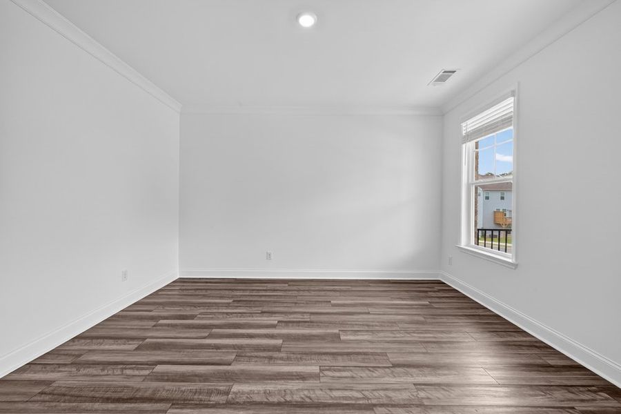 Representative unfurnished interior of a home built from the Kirkwood by Taylor Morrison in Dreycott, Lawrenceville (Image 23).