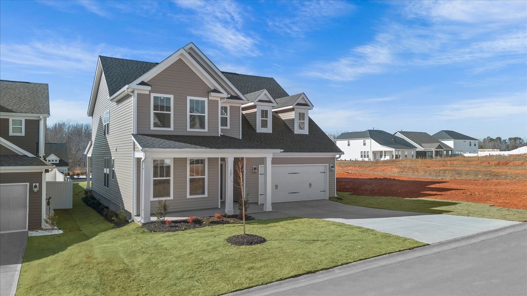 Front exterior of a new home in Fox Hollow, Spartanburg, SC, highlighting curb appeal (Image 20).