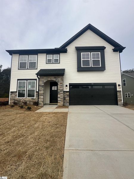 Front exterior of a new home in Shiloh Trail, Wellford, SC, highlighting curb appeal (Image 18).