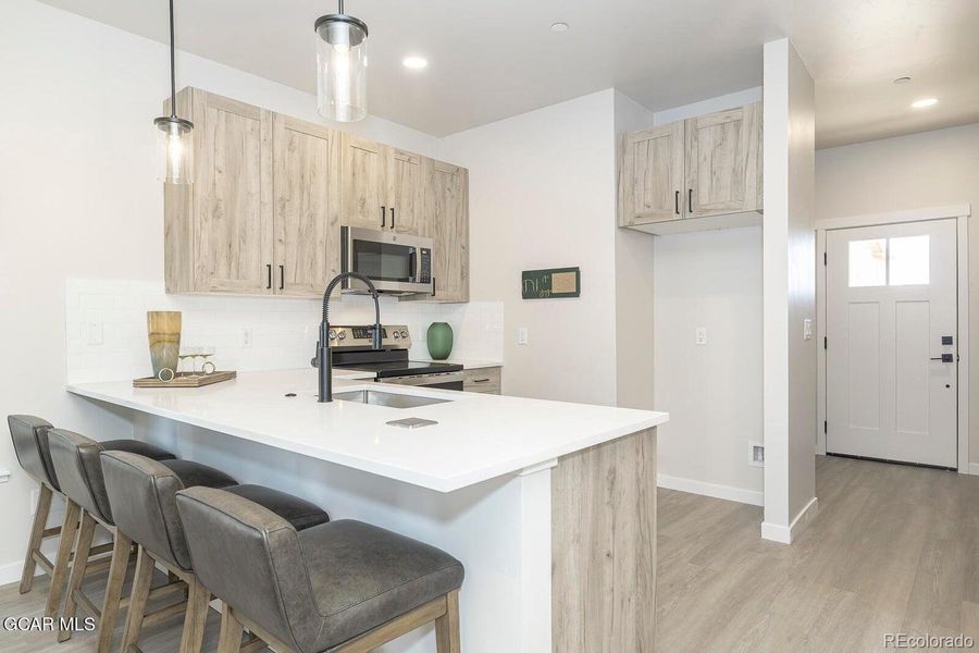 Furnished interior view inside a new home in , Granby (Image 26).