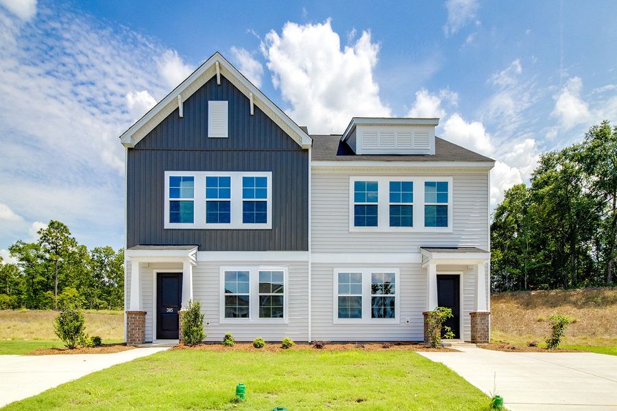 Front exterior of a new home in Padgett Commons, Hopkins, SC, highlighting curb appeal (Image 2). Front exterior of a new home in Padgett Commons, Hopkins, SC, highlighting curb appeal (Image 2).