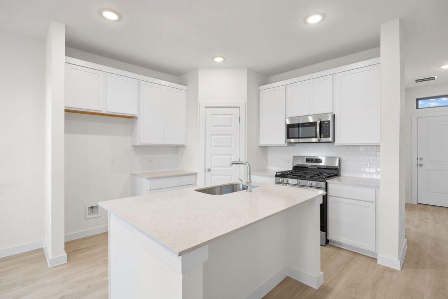 Furnished interior view inside a new home in Prairie Winds, Hutto (Image 4).