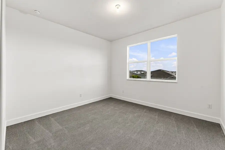 Spacious, unfurnished interior of a new home in Tradition, Port St. Lucie (Image 13).