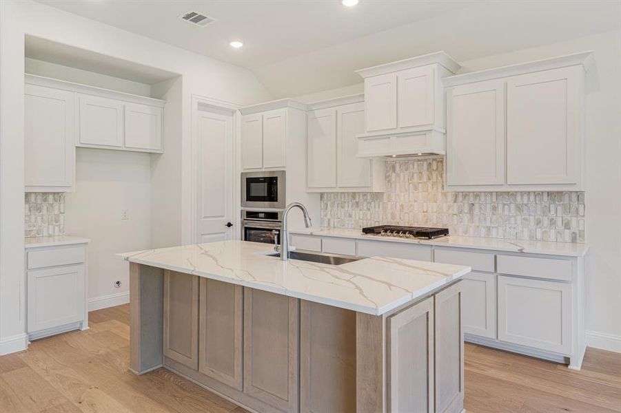Furnished interior view inside a new home in Windsong Ranch Classic 61, Prosper (Image 10). Furnished interior view inside a new home in Windsong Ranch Classic 61, Prosper (Image 10).