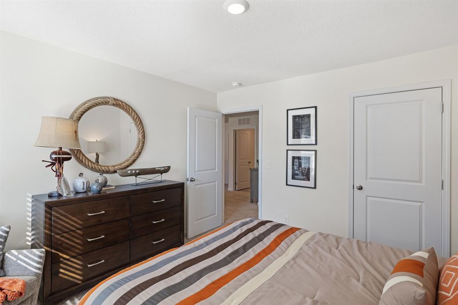 Representative furnished interior of a home built from the Hanover by D.R. Horton in Hillcrest Landing, McDonald (Image 18).