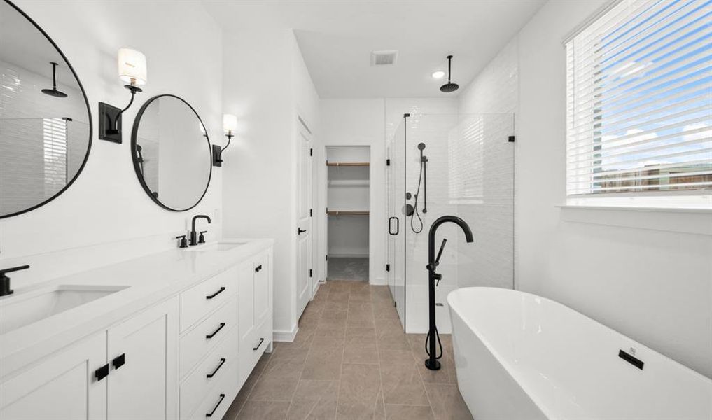 When we say this home is gorgeous and stunning we mean it! From the curb appeal, to the flooring, and fixtures to all the upgrades, attention to detail is obvious throughout. Can you imagine relaxing in this amazing tub after a long day? WOW!