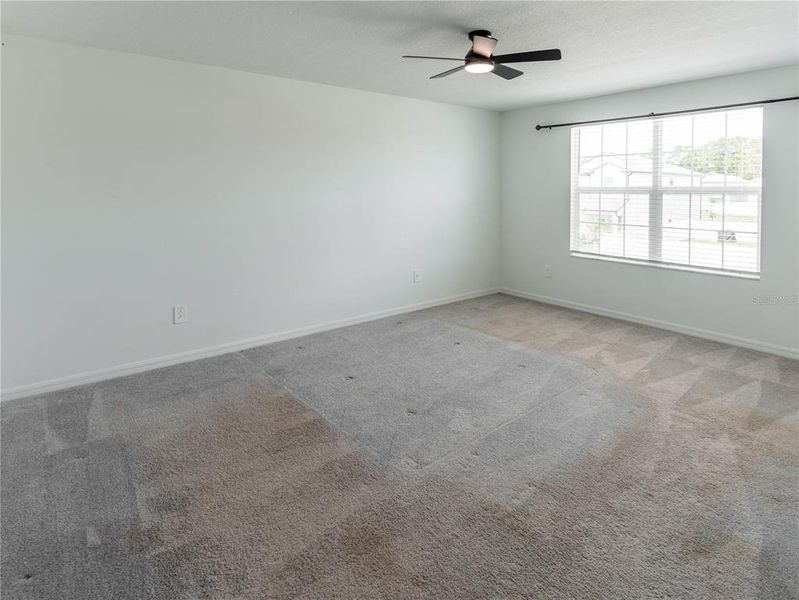 Spacious, unfurnished interior of a new home in The Isle of Avalon, Spring Hill (Image 21).