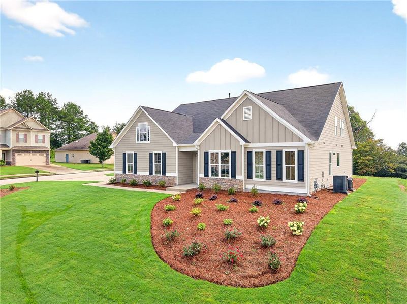 Front exterior of a new home in , Hiram, GA, highlighting curb appeal (Image 2).