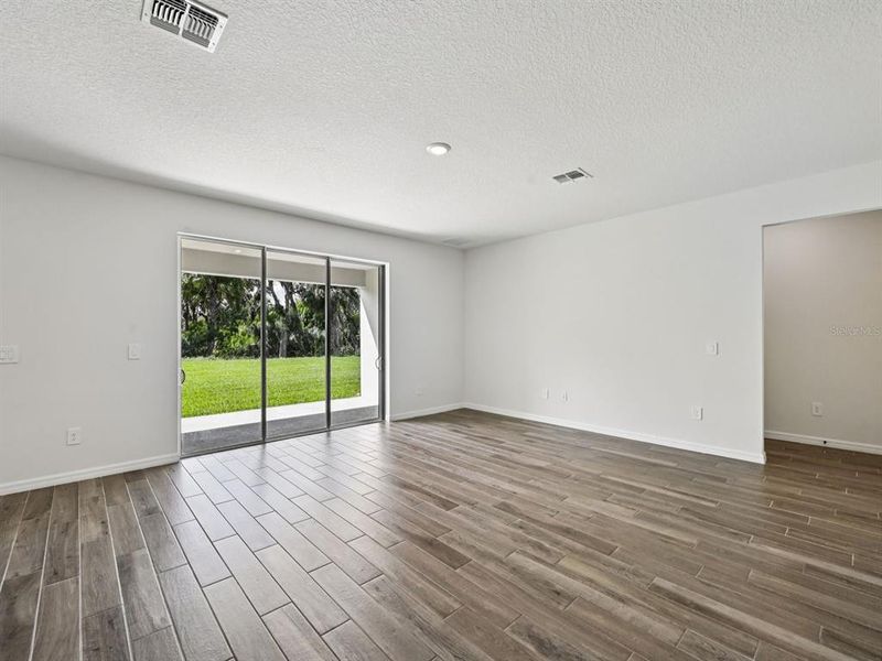 Spacious, unfurnished interior of a new home in Oakfield Trails - Premier Series, Parrish (Image 14).