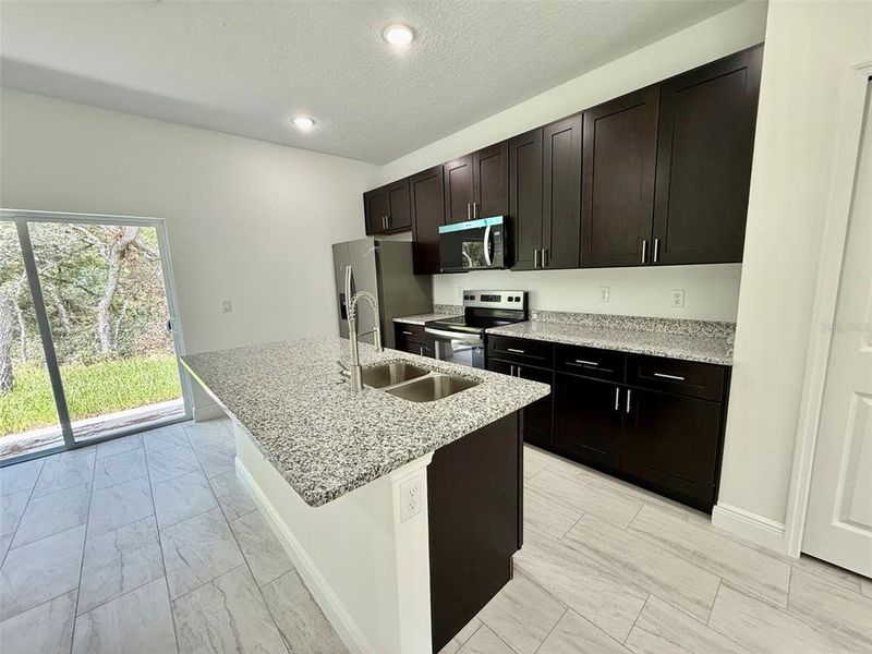 Furnished interior view inside a new home in , Citrus Springs (Image 7).